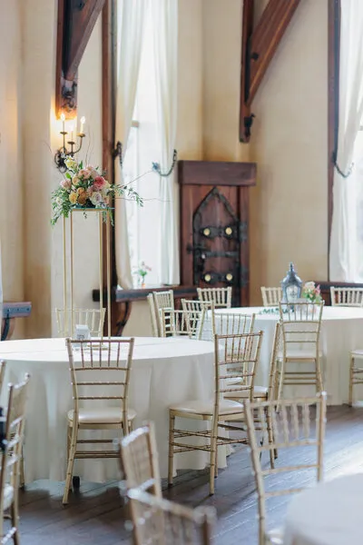 Set up for a wedding dinner in the great hall